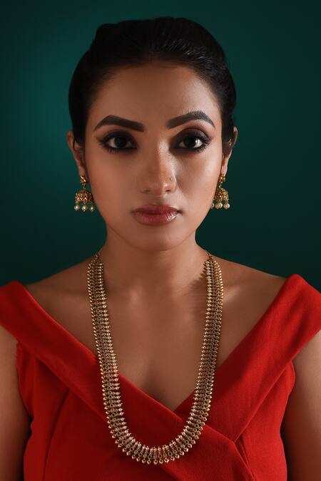 Shop_Zaza By Somya_Gold Plated Stones Celestial Beauty Temple Carved Necklace Set _Online_at_Aza_Fashions