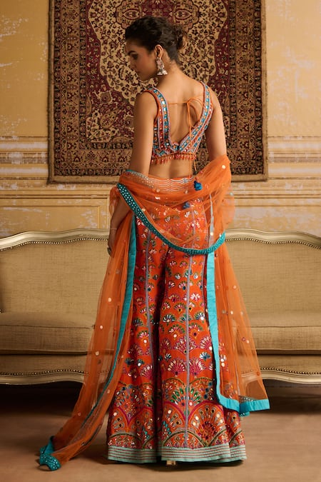 Shop Diyarajvvir Orange Silk, Tulle Beads, Mirrors Plunge Neck Embroidered Blouse Sharara Set at Aza Fashions Shop_Diyarajvvir_Orange Silk, Tulle Beads, Mirrors Plunge Neck Embroidered Blouse Sharara Set _at_Aza_Fashions