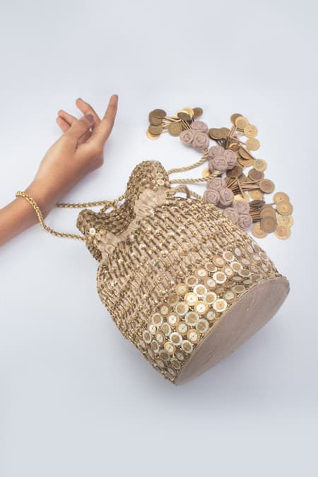 Shop Vareli Bafna Gold Coin O Zari And Cutdana Embellished Potli Bag at Aza Fashions Shop_Vareli Bafna_Gold Coin O Zari And Cutdana Embellished Potli Bag_at_Aza_Fashions