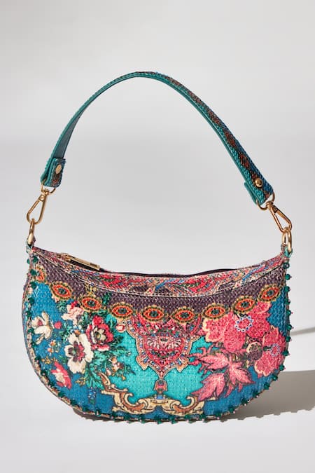 The Garnish Company_Blue Printed Thalia Floral Sequined Crecent Bag _at_Aza_Fashions