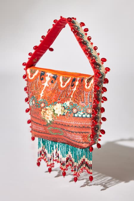 Buy_The Garnish Company_Blue Printed Crisann Floral Tassel Potli _Online_at_Aza_Fashions