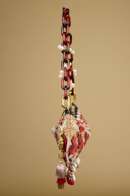 The Garnish Company Red Printed Ushra Floral Tasselled Bag Online at Aza Fashions The Garnish Company_Red Printed Ushra Floral Tasselled Bag _Online_at_Aza_Fashions