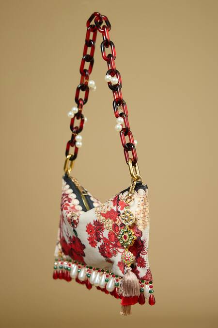 Buy The Garnish Company Red Printed Ushra Floral Tasselled Bag Online at Aza Fashions Buy_The Garnish Company_Red Printed Ushra Floral Tasselled Bag _Online_at_Aza_Fashions
