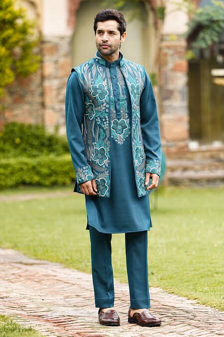 Courtyard By Abhi Green Lycra Cut Work, Embroidery, Zari, Diamonds Iris Bloom Long Bundi Set at Aza Fashions Courtyard By Abhi_Green Lycra Cut Work, Embroidery, Zari, Diamonds Iris Bloom Long Bundi Set _at_Aza_Fashions