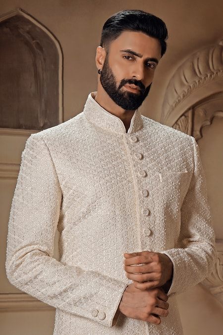 Vanshik Off White Silk Embroidered Swarovski Floral Thread Sherwani Pant Set Online at Aza Fashions Vanshik_Off White Silk Embroidered Swarovski Floral Thread Sherwani Pant Set _Online_at_Aza_Fashions