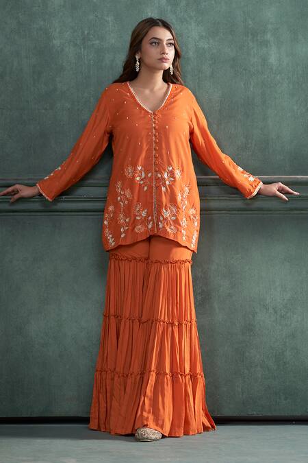 Hirika & Dhruti Orange Modal, Silk, Mohair, Organza Floral Embroidered Short Kurta Sharara Set at Aza Fashions Hirika & Dhruti_Orange Modal, Silk, Mohair, Organza Floral Embroidered Short Kurta Sharara Set _at_Aza_Fashions