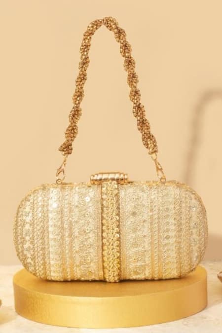 Shop Amyra Gold Embroidery, Beads, Sequins Naaz Floral Capsule Clutch at Aza Fashions Shop_Amyra_Gold Embroidery, Beads, Sequins Naaz Floral Capsule Clutch _at_Aza_Fashions