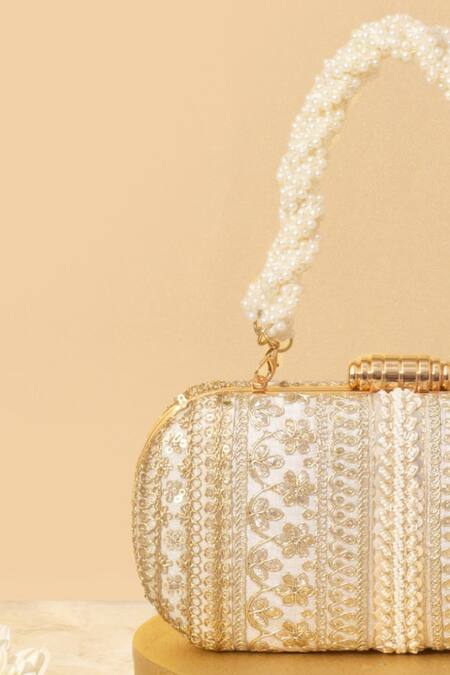 Shop Amyra Off White Embroidery, Sequins, Beads Naaz Flower Capsule Clutch Online at Aza Fashions Shop_Amyra_Off White Embroidery, Sequins, Beads Naaz Flower Capsule Clutch_Online_at_Aza_Fashions