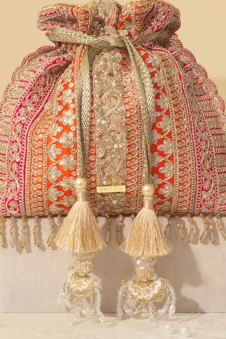 Amyra_Orange Embroidery, Tassels Naaz Color Block Potli _Online_at_Aza_Fashions