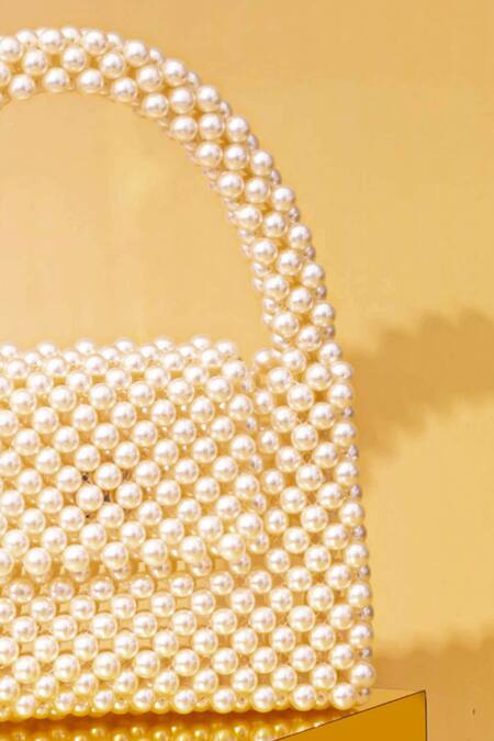 Shop Amyra Off White Pearls Lenora Embellished Bag Online at Aza Fashions Shop_Amyra_Off White Pearls Lenora Embellished Bag _Online_at_Aza_Fashions