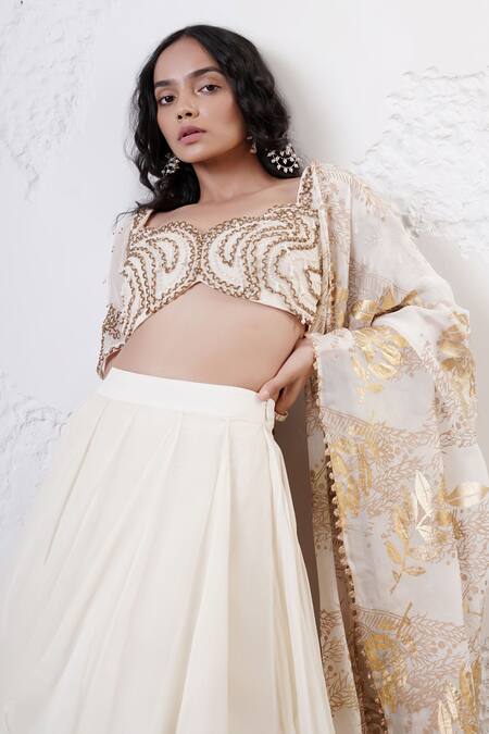 Buy_Shwetanga_Ivory Organza Sequins, Beads, Foil Printing Ruffle Layered Lehenga Set 