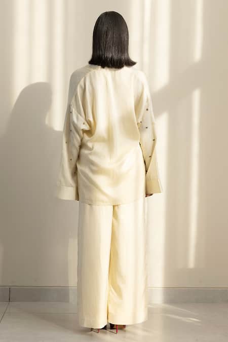 Shop Studio Surbhi Cream Cotton, Silk Embroidery Collared Floral Shirt With Straight Pant at Aza Fashions Shop_Studio Surbhi_Cream Cotton, Silk Embroidery Collared Floral Shirt With Straight Pant _at_Aza_Fashions