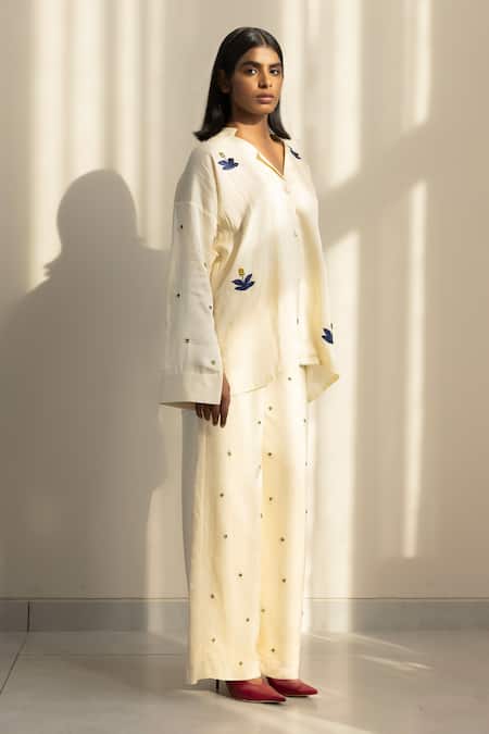 Studio Surbhi Cream Cotton, Silk Embroidery Collared Floral Shirt With Straight Pant at Aza Fashions Studio Surbhi_Cream Cotton, Silk Embroidery Collared Floral Shirt With Straight Pant _at_Aza_Fashions