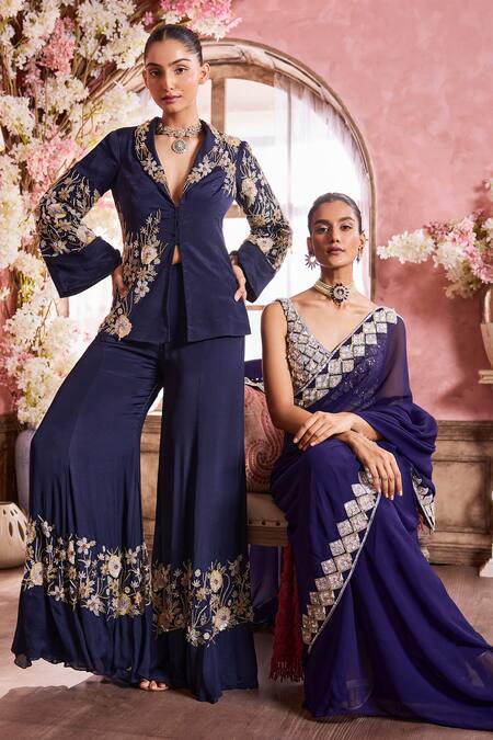 Krisha Sunny Ramani Blue Georgette Sequins, Beads, Crystals Embroidered Pre-draped Saree With Blouse at Aza Fashions Krisha Sunny Ramani_Blue Georgette Sequins, Beads, Crystals Embroidered Pre-draped Saree With Blouse _at_Aza_Fashions