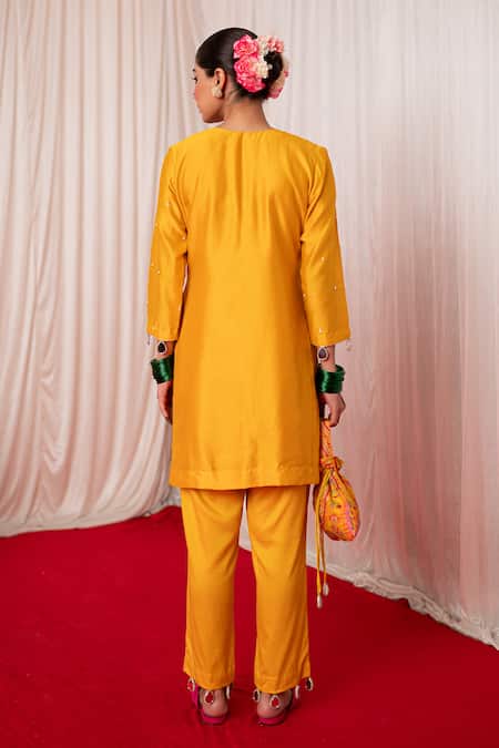 Shop Chrkha Yellow Cotton Satin Embroidery Tassel Paisley Motif Short Kurta With Pant at Aza Fashions Shop_Chrkha_Yellow Cotton Satin Embroidery Tassel Paisley Motif Short Kurta With Pant _at_Aza_Fashions