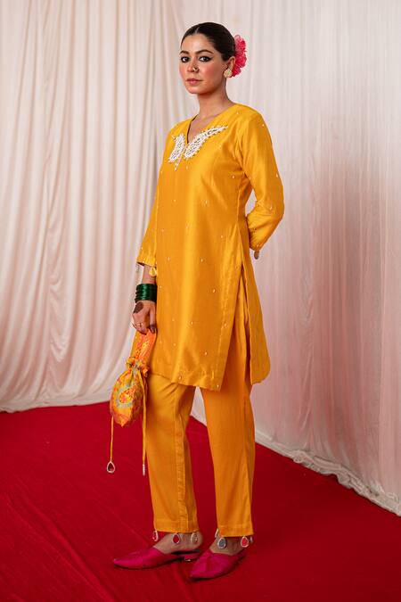 Shop Chrkha Yellow Cotton Satin Embroidery Tassel Paisley Motif Short Kurta With Pant Online at Aza Fashions Shop_Chrkha_Yellow Cotton Satin Embroidery Tassel Paisley Motif Short Kurta With Pant _Online_at_Aza_Fashions