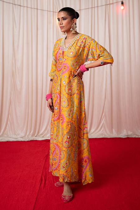 Chrkha Yellow Chanderi Silk Print Tassel V-neck Paisley Mirror Embroidered Kaftan Online at Aza Fashions Chrkha_Yellow Chanderi Silk Print Tassel V-neck Paisley Mirror Embroidered Kaftan _Online_at_Aza_Fashions