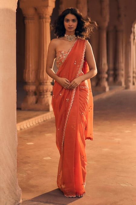 Paulmi and Harsh Orange Blouse Chiniya Silk Scallop Border Pre-draped Saree With Corset 