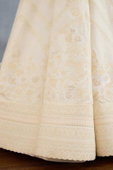 Shop Torani Ivory Organza, Jersey Pearls, Beads, Zari Maahe Saahiba Embroidered Lehenga Set Online at Aza Fashions Shop_Torani_Ivory Organza, Jersey Pearls, Beads, Zari Maahe Saahiba Embroidered Lehenga Set _Online_at_Aza_Fashions