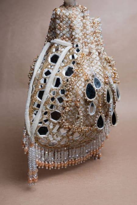 Buy Nayaab By Sonia Ivory Mirrors, Beads, Applique Aaina Jaal Jhaalar Embroidered Potli Bag Online at Aza Fashions Buy_Nayaab By Sonia_Ivory Mirrors, Beads, Applique Aaina Jaal Jhaalar Embroidered Potli Bag _Online_at_Aza_Fashions