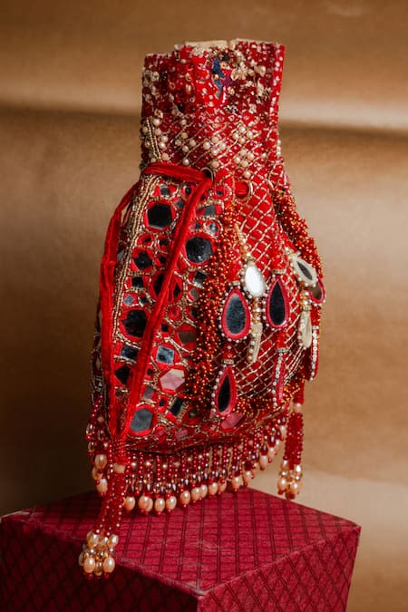 Shop Nayaab By Sonia Red Mirrors, Beads, Applique Aaina Jaal Jhaalar Embroidered Potli Bag at Aza Fashions Shop_Nayaab By Sonia_Red Mirrors, Beads, Applique Aaina Jaal Jhaalar Embroidered Potli Bag _at_Aza_Fashions