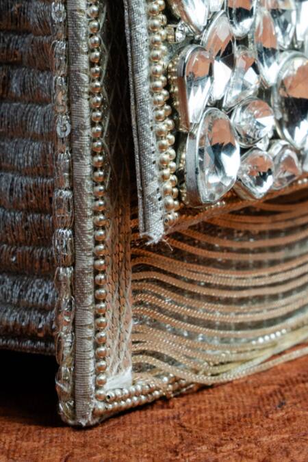 Buy Nayaab By Sonia Silver Stones, Chains, Embroidery Kasse Petal Embellished Clutch Bag Online at Aza Fashions Buy_Nayaab By Sonia_Silver Stones, Chains, Embroidery Kasse Petal Embellished Clutch Bag _Online_at_Aza_Fashions