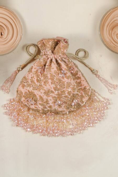 Shop Nayaab By Sonia Pink Beads, Sequins, Crystals, Tassels Leafy Cutdana Embroidered Potli Bag at Aza Fashions Shop_Nayaab By Sonia_Pink Beads, Sequins, Crystals, Tassels Leafy Cutdana Embroidered Potli Bag _at_Aza_Fashions