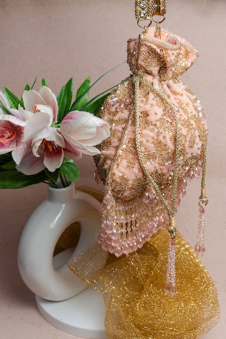 Nayaab By Sonia Pink Beads, Sequins, Crystals, Tassels Leafy Cutdana Embroidered Potli Bag at Aza Fashions Nayaab By Sonia_Pink Beads, Sequins, Crystals, Tassels Leafy Cutdana Embroidered Potli Bag _at_Aza_Fashions