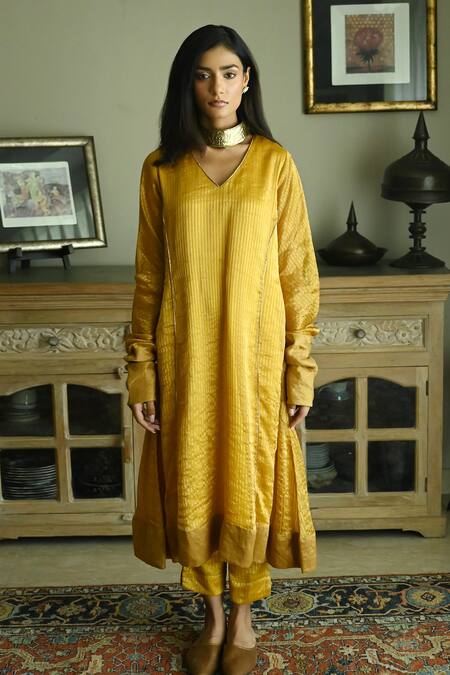 Shorshe Clothing_Yellow Chanderi, Handloom Cotton Anu Stripe Pattern Kurta And Cigarette Pant Set_at_Aza_Fashions