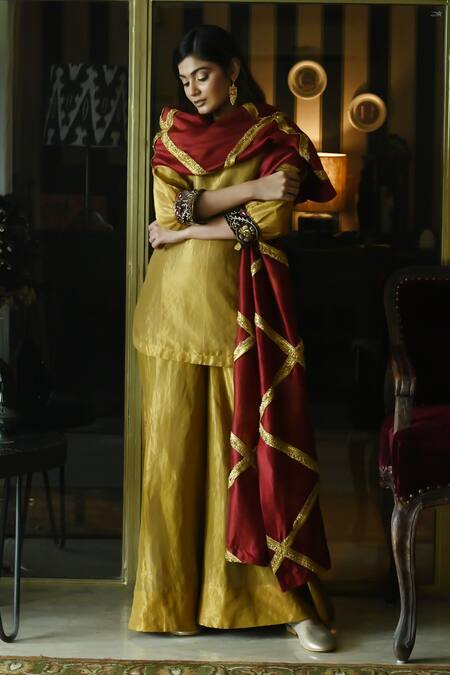 Buy_Shorshe Clothing_Gold Handloom Cotton Embroidery High Neck Megan Sleeve Hem Kurta With Gharara _Online_at_Aza_Fashions