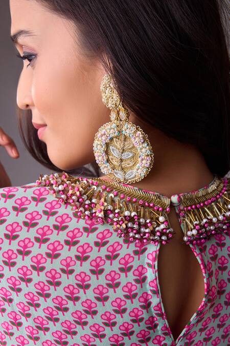 Nikasha Purple Georgette, Silk Embroidery, Asymmetrical Floral Print Kurta Palazzo Set at Aza Fashions Nikasha_Purple Georgette, Silk Embroidery, Asymmetrical Floral Print Kurta Palazzo Set _at_Aza_Fashions