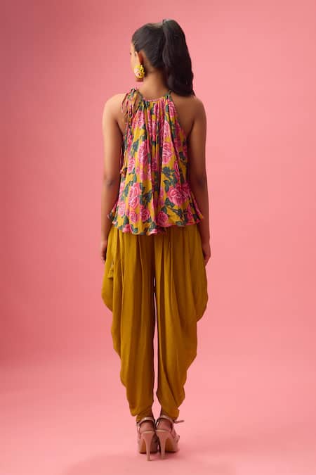 Shop Nikasha Yellow Georgette, Silk, Cotton Halter Peony Bloom Print Top With Dhoti Pant at Aza Fashions Shop_Nikasha_Yellow Georgette, Silk, Cotton Halter Peony Bloom Print Top With Dhoti Pant _at_Aza_Fashions
