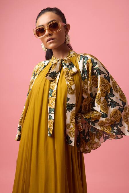 Nikasha_Yellow Georgette, Modal Collared Rosa Print Tie Up Cape Dress _Online_at_Aza_Fashions