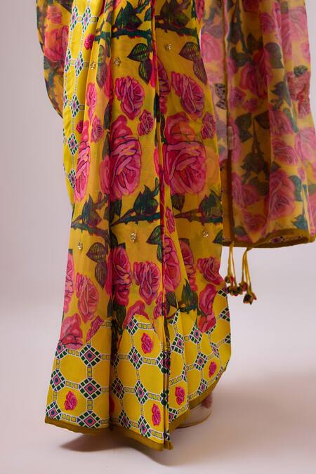 Shop Nikasha Yellow Georgette, Rayon Tassels, Diamonds Phool Bagh Print Saree With Blouse Online at Aza Fashions Shop_Nikasha_Yellow Georgette, Rayon Tassels, Diamonds Phool Bagh Print Saree With Blouse _Online_at_Aza_Fashions