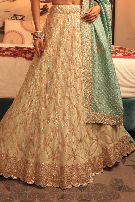 Bandhani Off White Silk, Tissue Sequins, Gota Patti V-neck Embroidered Lehenga Set Online at Aza Fashions Bandhani_Off White Silk, Tissue Sequins, Gota Patti V-neck Embroidered Lehenga Set _Online_at_Aza_Fashions