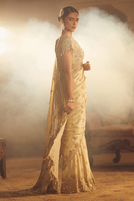Azeera_Rose Gold Silk Tassels, Sequins V-neck Arsh Floral Embroidered Saree With Blouse _Online_at_Aza_Fashions