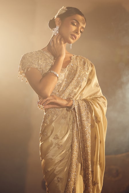 Azeera_Rose Gold Silk Tassels, Sequins V-neck Arsh Floral Embroidered Saree With Blouse _at_Aza_Fashions