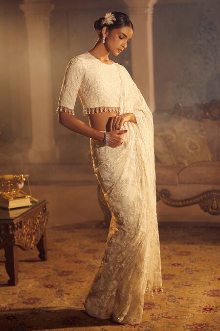 Azeera Ivory Silk Cut Work, Beads, Sequins Floral Jaal Embroidered Saree With Blouse at Aza Fashions Azeera_Ivory Silk Cut Work, Beads, Sequins Floral Jaal Embroidered Saree With Blouse _at_Aza_Fashions