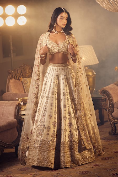Shop Azeera Ivory Silk Sequins, Zari Plunge Prachi Zardozi Embroidered Bridal Lehenga Set Online at Aza Fashions Shop_Azeera_Ivory Silk Sequins, Zari Plunge Prachi Zardozi Embroidered Bridal Lehenga Set _Online_at_Aza_Fashions
