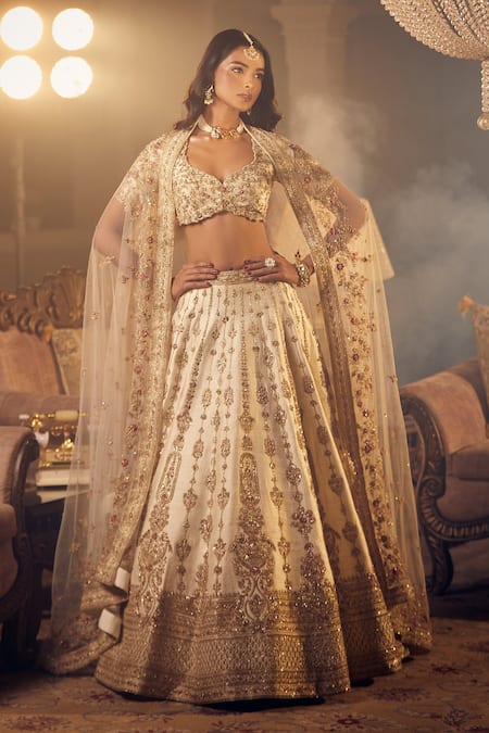 Azeera Ivory Silk Sequins, Zari Plunge Prachi Zardozi Embroidered Bridal Lehenga Set at Aza Fashions Azeera_Ivory Silk Sequins, Zari Plunge Prachi Zardozi Embroidered Bridal Lehenga Set _at_Aza_Fashions