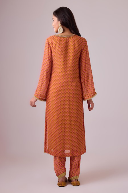 Shop Nikasha Peach Georgette Gota Patti, Beads, Tassels V-neck Floral Embroidered Kurta Set at Aza Fashions Shop_Nikasha_Peach Georgette Gota Patti, Beads, Tassels V-neck Floral Embroidered Kurta Set _at_Aza_Fashions