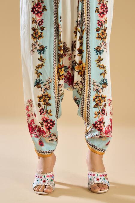 Rajdeep Ranawat Ivory Modal, Satin Florista Print Turkish Pant Online at Aza Fashions Rajdeep Ranawat_Ivory Modal, Satin Florista Print Turkish Pant _Online_at_Aza_Fashions