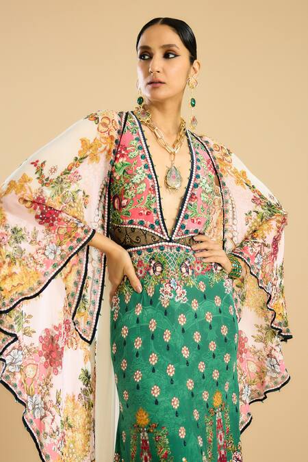 Rajdeep Ranawat_Ivory Chiffon, Silk Plunge Neck Camilla Floral Print Flared Gown _at_Aza_Fashions