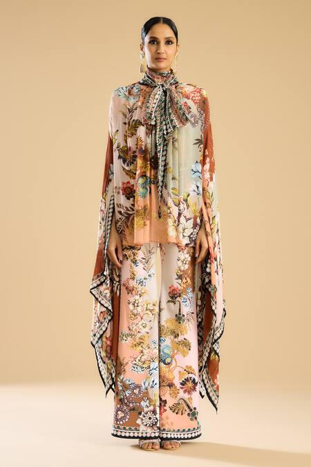 Rajdeep Ranawat_Ivory Polyester, Lycra Barika Garden Print Bell Bottom Pant _Online_at_Aza_Fashions