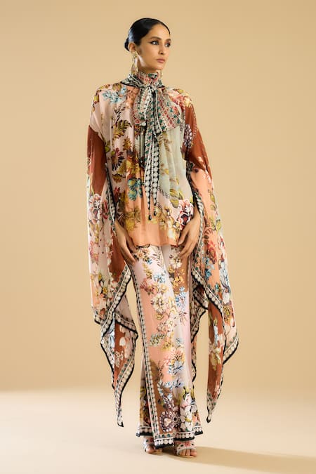 Rajdeep Ranawat_Ivory Polyester, Lycra Barika Garden Print Bell Bottom Pant _at_Aza_Fashions