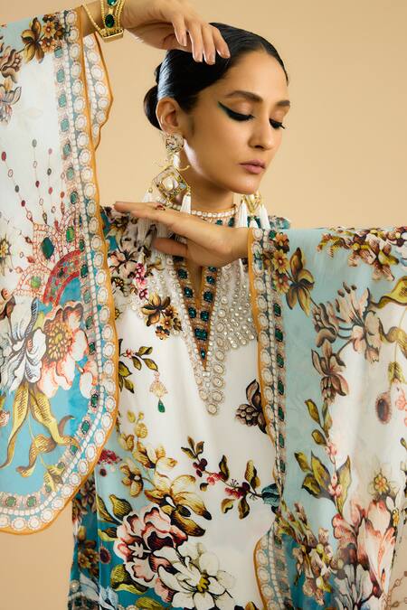 Rajdeep Ranawat_Ivory Silk, Modal Pearls, Misba Abstract Floral Print Top With Draped Skirt _at_Aza_Fashions