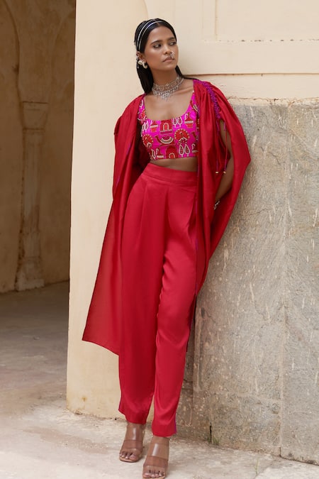 Pink City by Sarika Red Silk Embroidery Folklore Ghungroo Tassel Embellished Sleeves Cape And Pant Set 