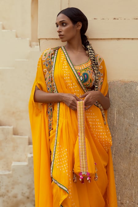 Pink City By Sarika Yellow Silk Embroidery, Beads Paisley Bloom Applique Cape And Pick Up Skirt Set at Aza Fashions Pink City By Sarika_Yellow Silk Embroidery, Beads Paisley Bloom Applique Cape And Pick Up Skirt Set _at_Aza_Fashions