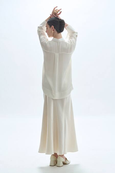 Shop Aroka Ivory Velvet Flared Bottom Skirt at Aza Fashions Shop_Aroka_Ivory Velvet Flared Bottom Skirt_at_Aza_Fashions