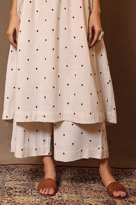 Mati_Off White Cotton Embroidery Heart Flared Pant _Online_at_Aza_Fashions